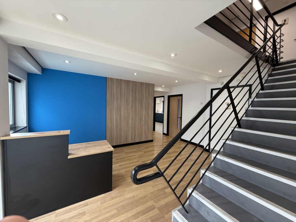 Modern office staircase and interior by HE Interiors